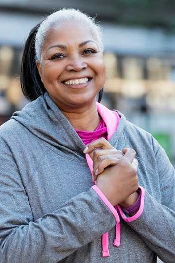 Gray Hoodie with Pink Trim on a woman over 60, cozy winter casual outfit idea 22