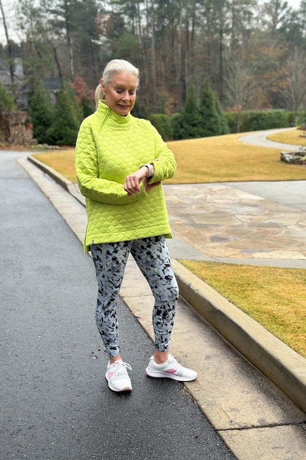 Lime Turtleneck with Patterned Leggings and White Sneakers on a woman over 60, cozy winter casual outfit idea 24