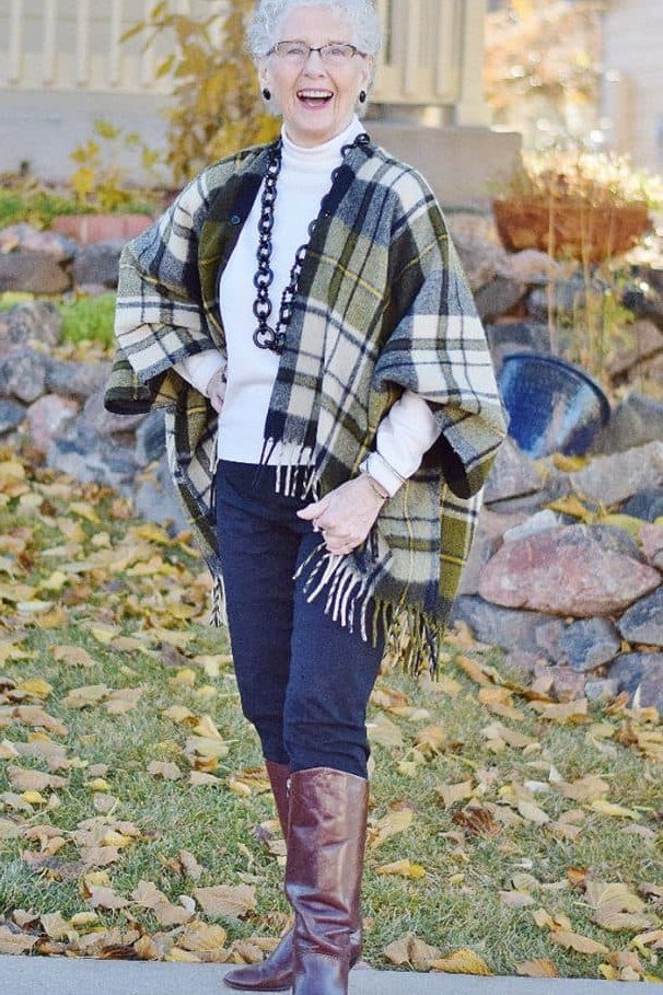 Green Plaid Shawl with Jeans and Brown Boots on a woman over 60, cozy winter casual outfit idea 50