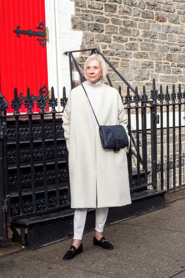 White Winter Coat with White Trousers on older woman, cozy winter outfit for women over 60