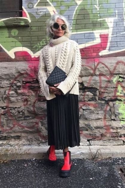 White Cable Sweater with Black Pleated Skirt on older woman, cozy winter outfit for women over 60