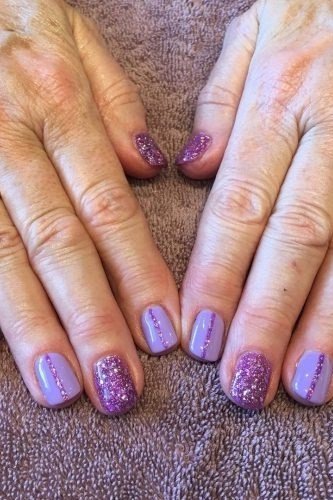 Classic Red with Gold Rings - winter nail idea for women over 60