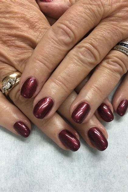 Classic Red with White Lace Accent - winter nail idea for women over 60