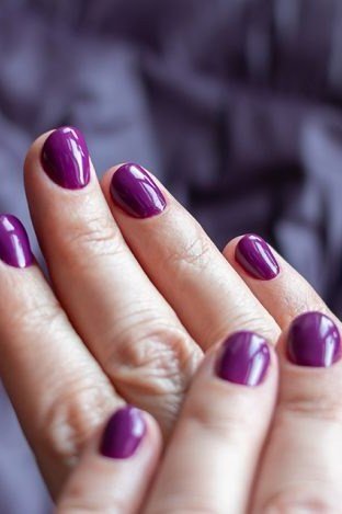 Red with Silver Glitter Tips - winter nail idea for women over 60