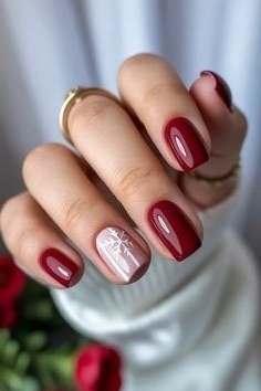 Cherry Red with a Tiny Gem Accent - winter nail idea for women over 60