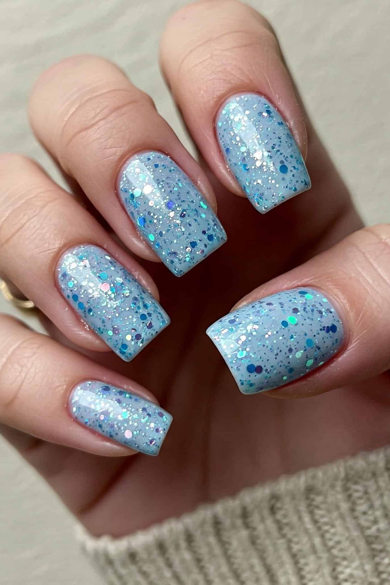 Red Snowflake and Cable-Knit Nails - winter nail idea for women over 60