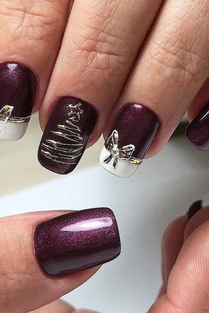 Burgundy short winter nails with gold bow and tree art