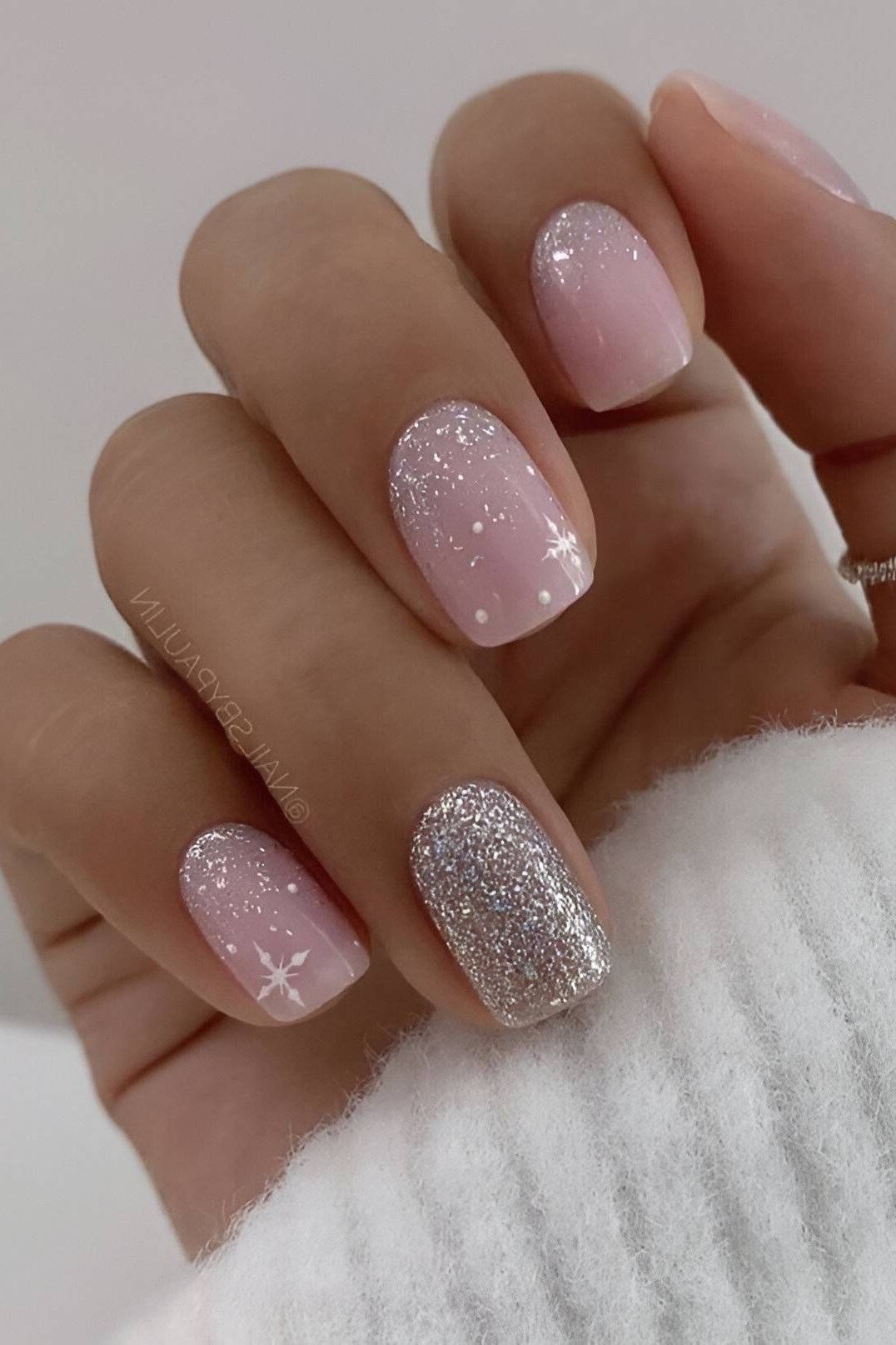 Lavender glitter short winter nails with snowflakes