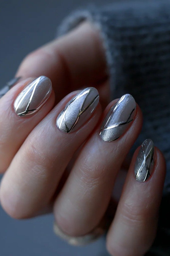 Silver blue chrome nails with diagonal line art