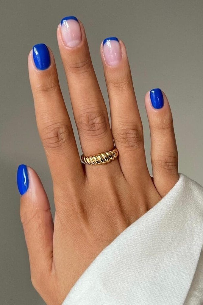 Bright cobalt blue glossy short winter nails