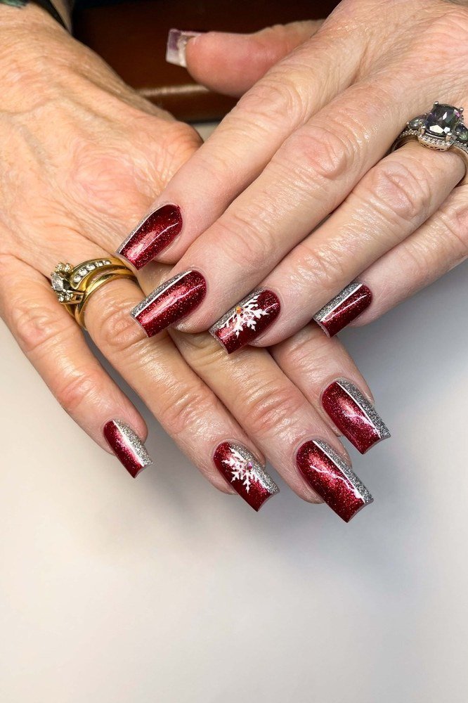Deep Red Nails with Snowflake Art - timeless winter nail color for women over 60