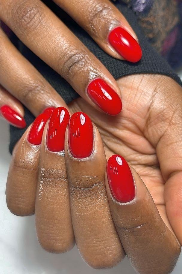 Glossy Red Almond Nails - timeless winter nail color for women over 60