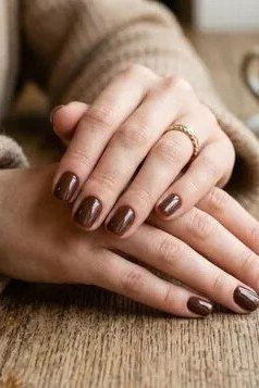 Burgundy Nails with a Coffee Cup - timeless winter nail color for women over 60