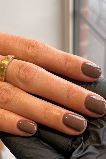 Taupe Nails on a Mature Hand - timeless winter nail color for women over 60