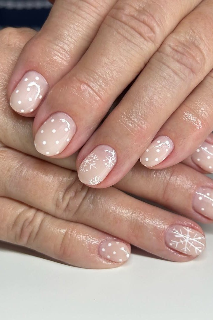 Nude Nails with White Snowflake Art - timeless winter nail color for women over 60