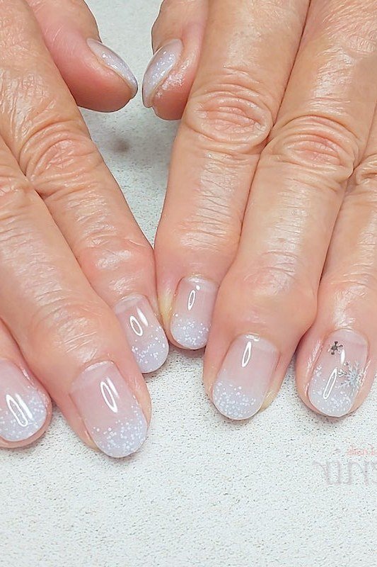 Frosty White Shimmer Nails - timeless winter nail color for women over 60