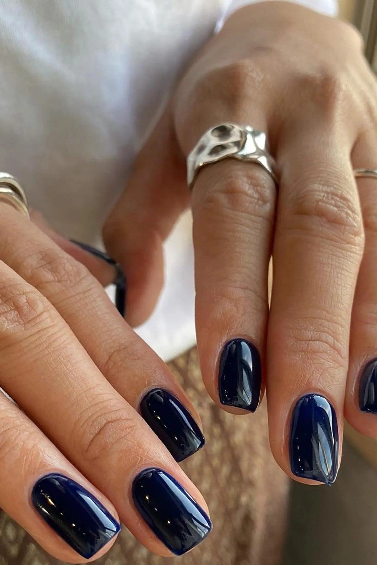 Dark Navy Nails on Mature Hands - timeless winter nail color for women over 60