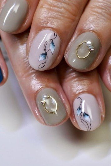 Navy and Nude Marble Mixed Nails - timeless winter nail color for women over 60