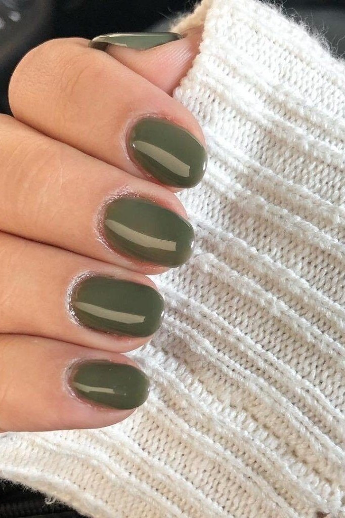 Olive Green Nails with a White Knit - timeless winter nail color for women over 60