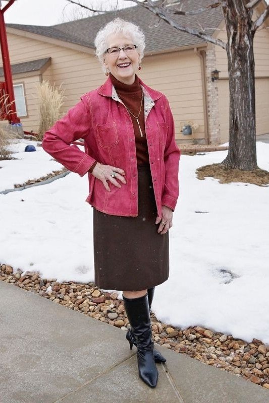 Rose pink quilted jacket over brown turtleneck and brown pencil skirt, fresh winter color outfit for women over 60