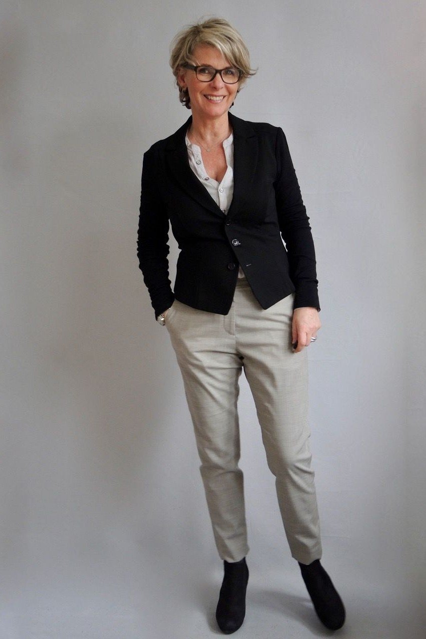 Black Blazer with Light Gray Trousers and Ankle Boots - work outfit idea for women over 50