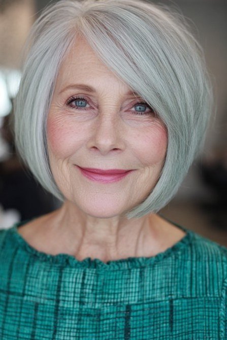 Silver smooth bob haircut for women over 70, sleek wash-and-wear jaw-length style