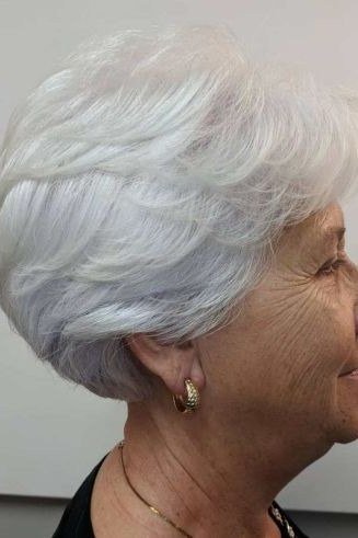 White rounded bob haircut side view for women over 70, full easy hairstyle