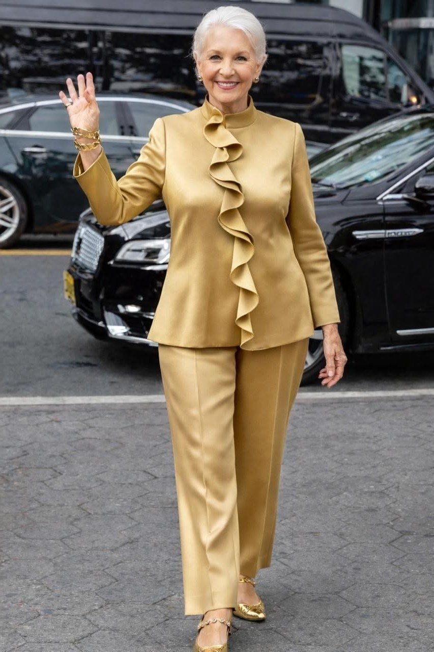 gold ruffle satin suit on street for bold christmas style