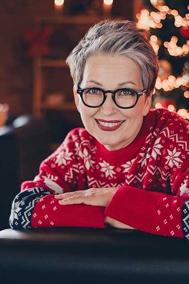 red fair isle sweater by christmas tree classic holiday style