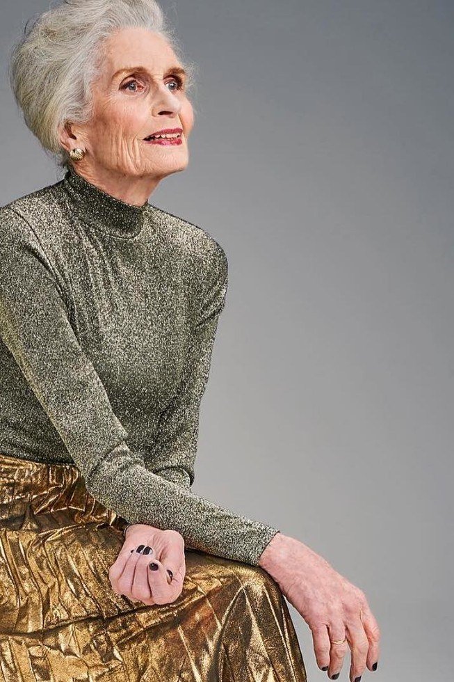 grey shimmer turtleneck with gold foil skirt for christmas evening