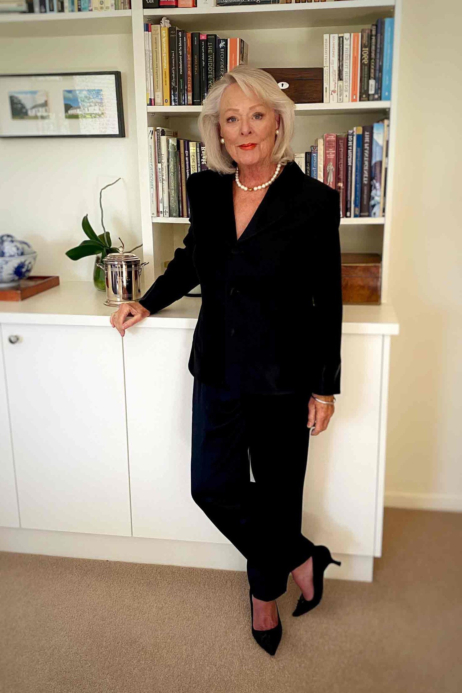 classic black blazer with pearls for timeless christmas elegance