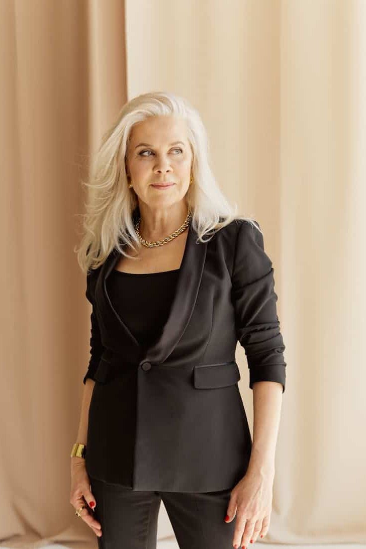 black satin camisole with black blazer for christmas evening