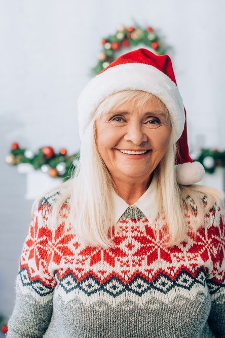 Red fair isle Christmas sweater with Santa hat, cozy holiday outfit for women over 70
