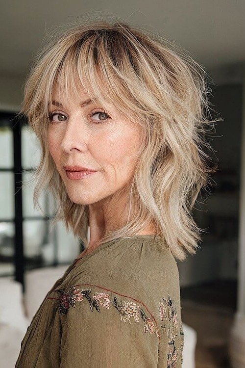 Blonde Shaggy Lob with Curtain Bangs for women over 60