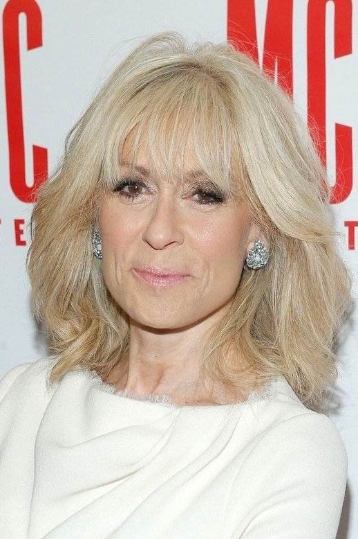 Blonde Cut with Brow-Skimming Bangs for women over 60