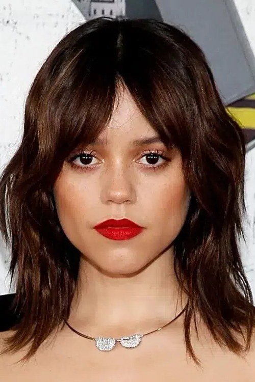 Shoulder Length Chocolate Shag with Bangs - youthful hairstyle for women over 40