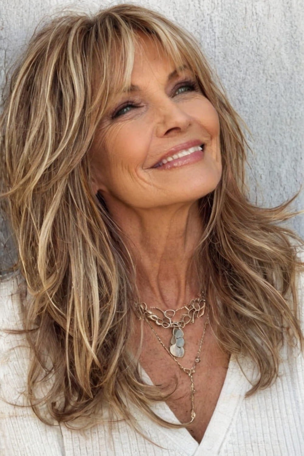 Long Beachy Blonde Layers with Texture - youthful hairstyle for women over 40
