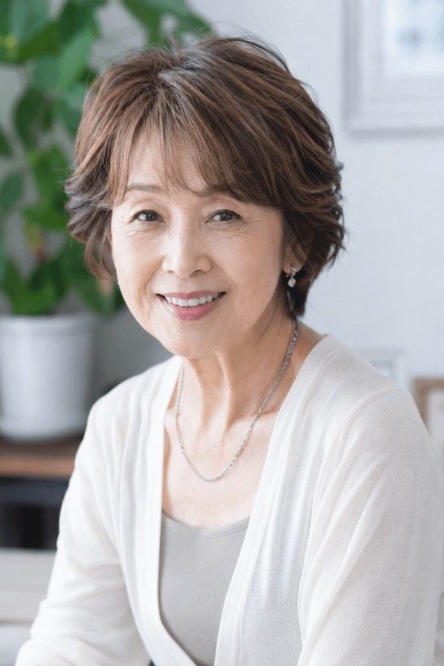 Dark Brown Textured Pixie with Edge - youthful hairstyle for women over 40
