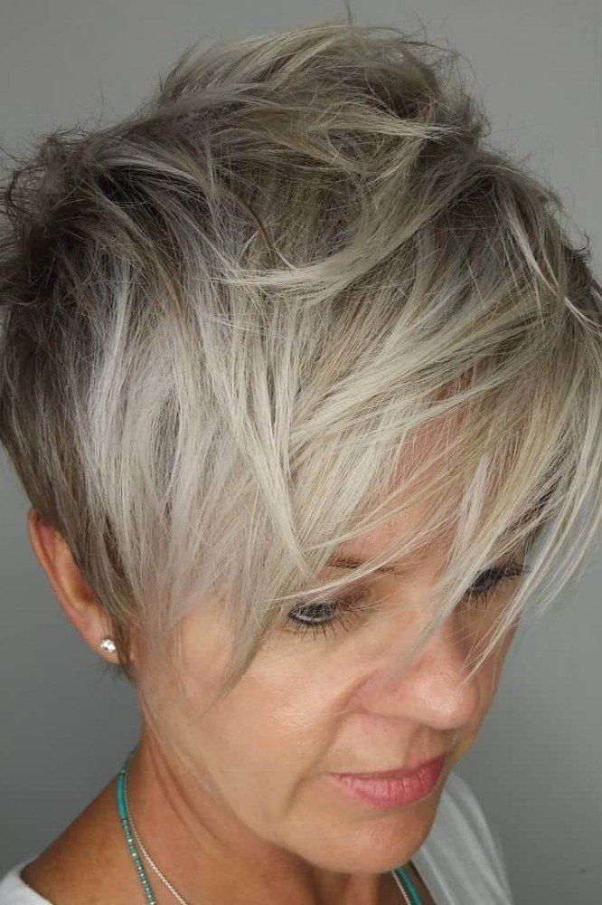 Silver Pixie with Side-Swept Bangs, a short hairstyle for women over 50